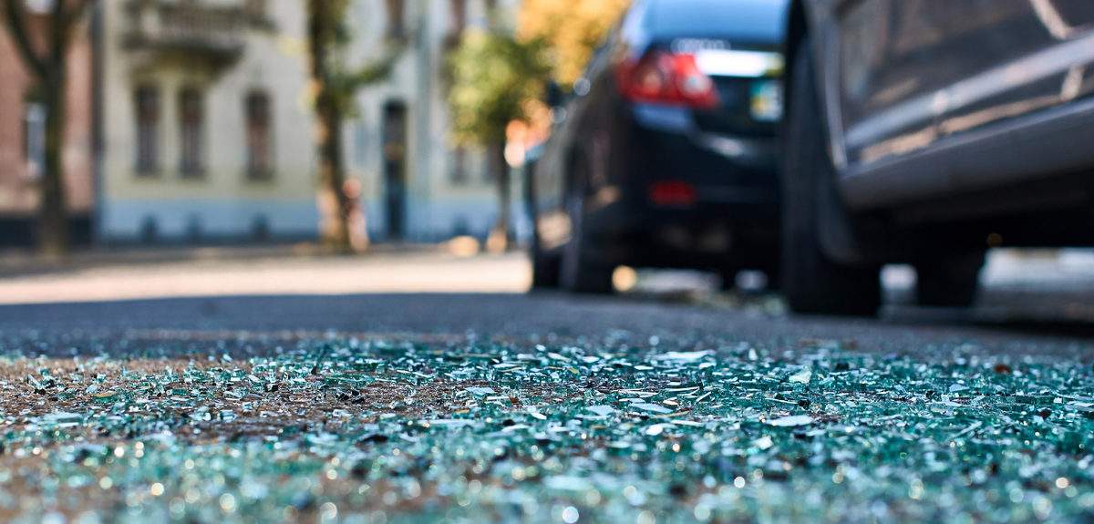 Car accident and glass on the street, similar to the scene of a Santa Ana car accident