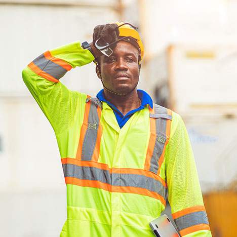 Construction worker wiping forehead - when are employers liable under California heat stroke law?