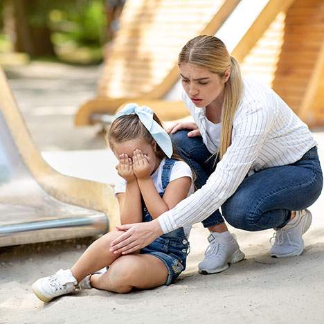 Mother with child injured on a playground - when should you file a playground injury lawsuit?