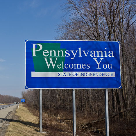 Pennsylvania state sign - learn the answer to, "Is Pennsylvania a no-fault state for car accidents?"