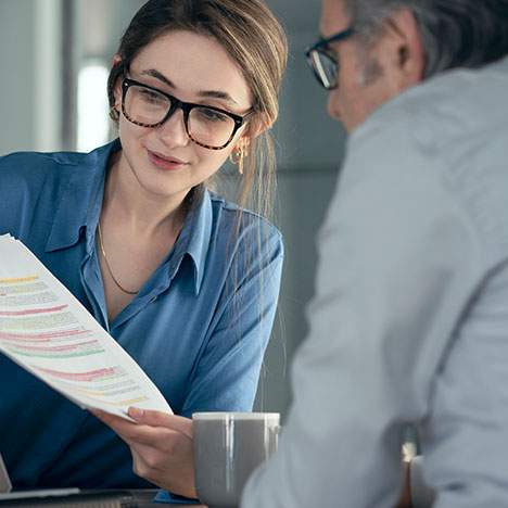 Woman showing man highlighted document - what are the chances of winning a personal injury lawsuit?