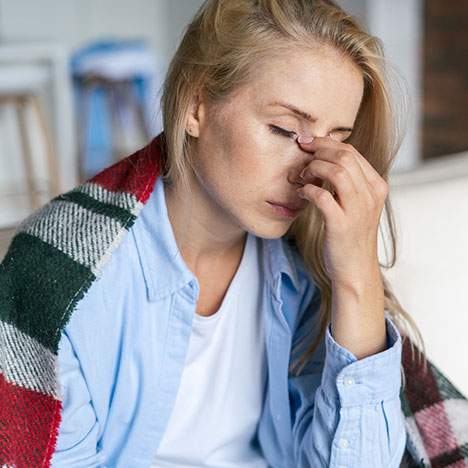 woman with had to forehead thinking can a car accident cause migraines