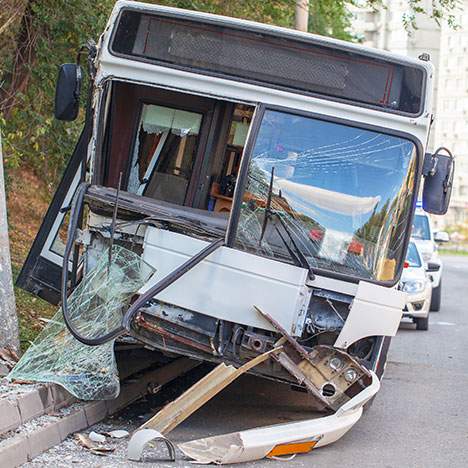 bus crushed on the side of the road - What to Do if You Are in a Bus Accident
