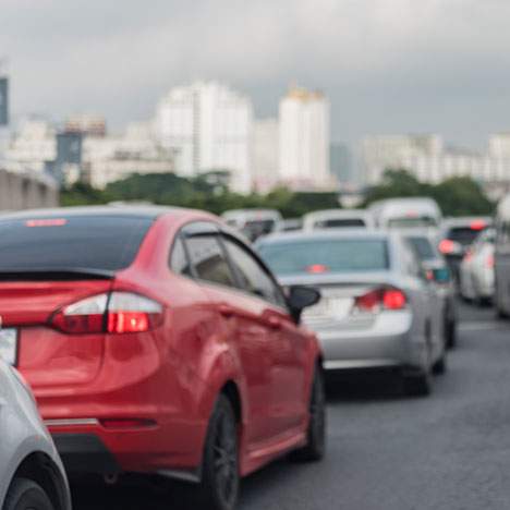 a row of cars in traffic