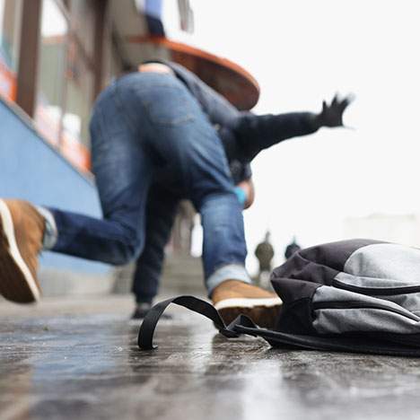 a person slipping onto the ground